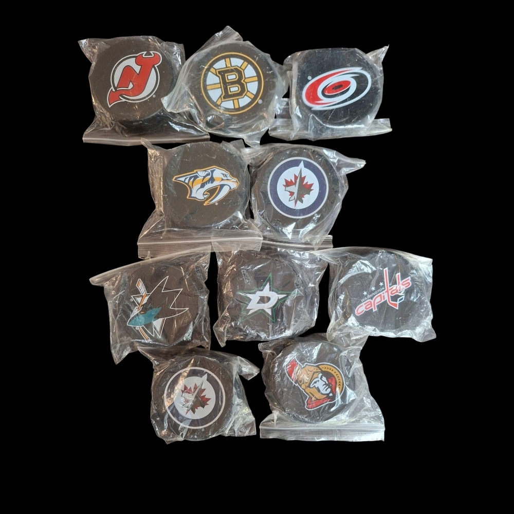 NEW - NHL Team Logo Hockey Puck Bottle Openers